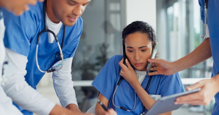 busy short staffed nursing team working in a facility